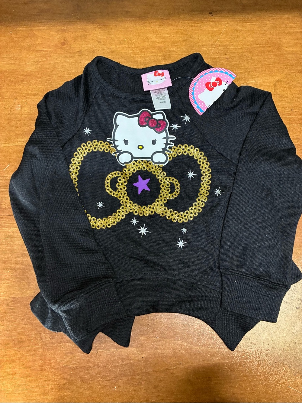 Hello Kitty Black Pullover with Gold Crown and Pink Bow